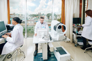 Ophthalmologists working in modern office